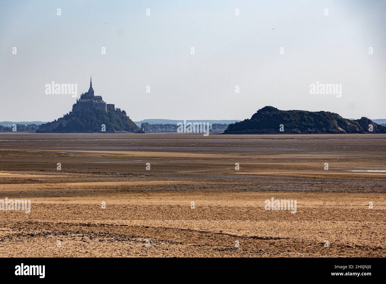 Sunset at the Beach in the bay of Le Mont-Saint-Michel, France Stock
