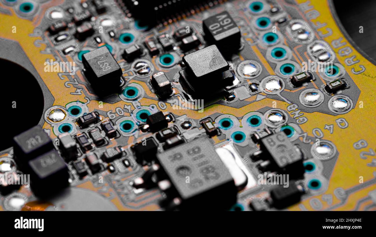 Macro Close up of printed wiring and components on PC circuit board ...