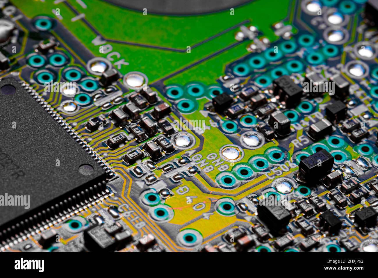 Macro Close up of printed wiring and components on PC circuit board ...