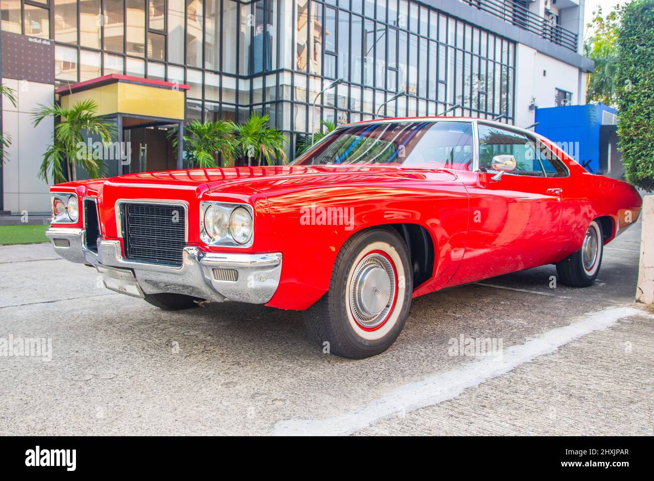 an American classic car in a parking lot in the city Stock Photo