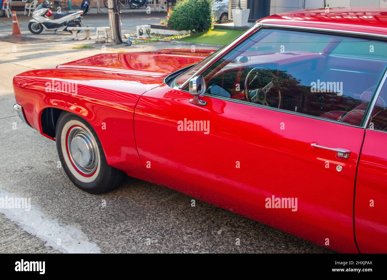 an American classic car in a parking lot in the city Stock Photo