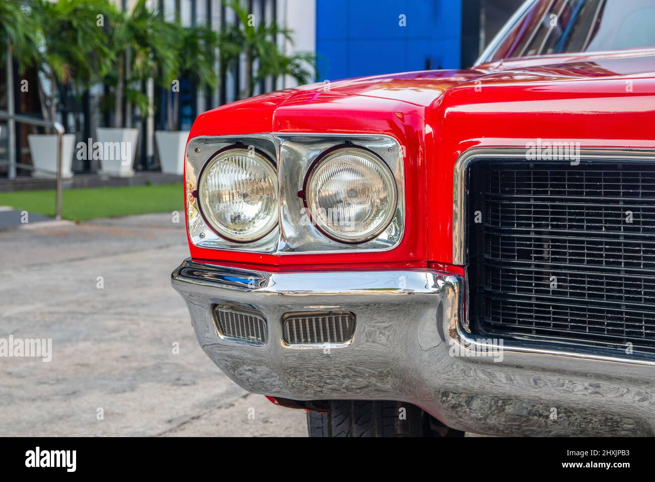 an American classic car in a parking lot in the city Stock Photo