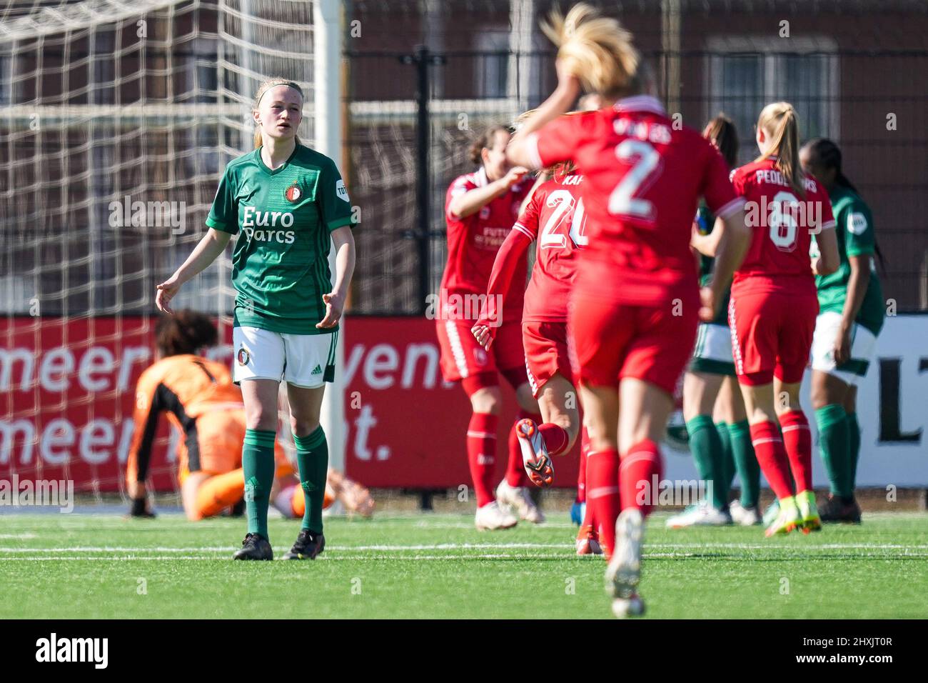 Enschede - Kim Hendriks of Feyenoord V1 reacts to the 3-0 by Fenna Kalma of FC Twente Vrouwen during the match between FC Twente V1 v Feyenoord V1 at Sportcampus Diekman on 13 March 2022 in Enschede, Netherlands. (Box to Box Pictures/Yannick Verhoeven) Stock Photo
