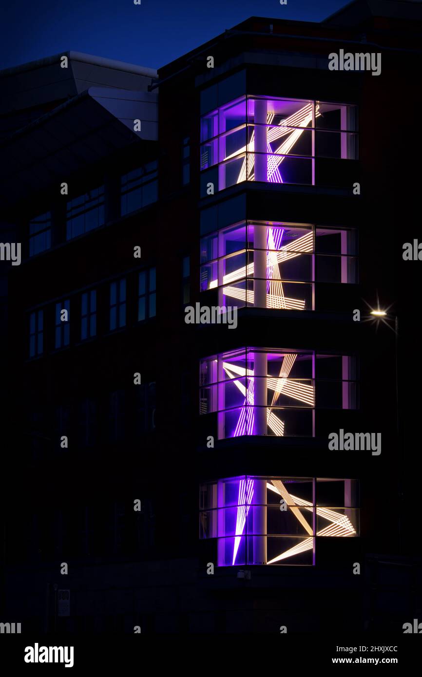 patterns of light in Manchester apartment windows Stock Photo