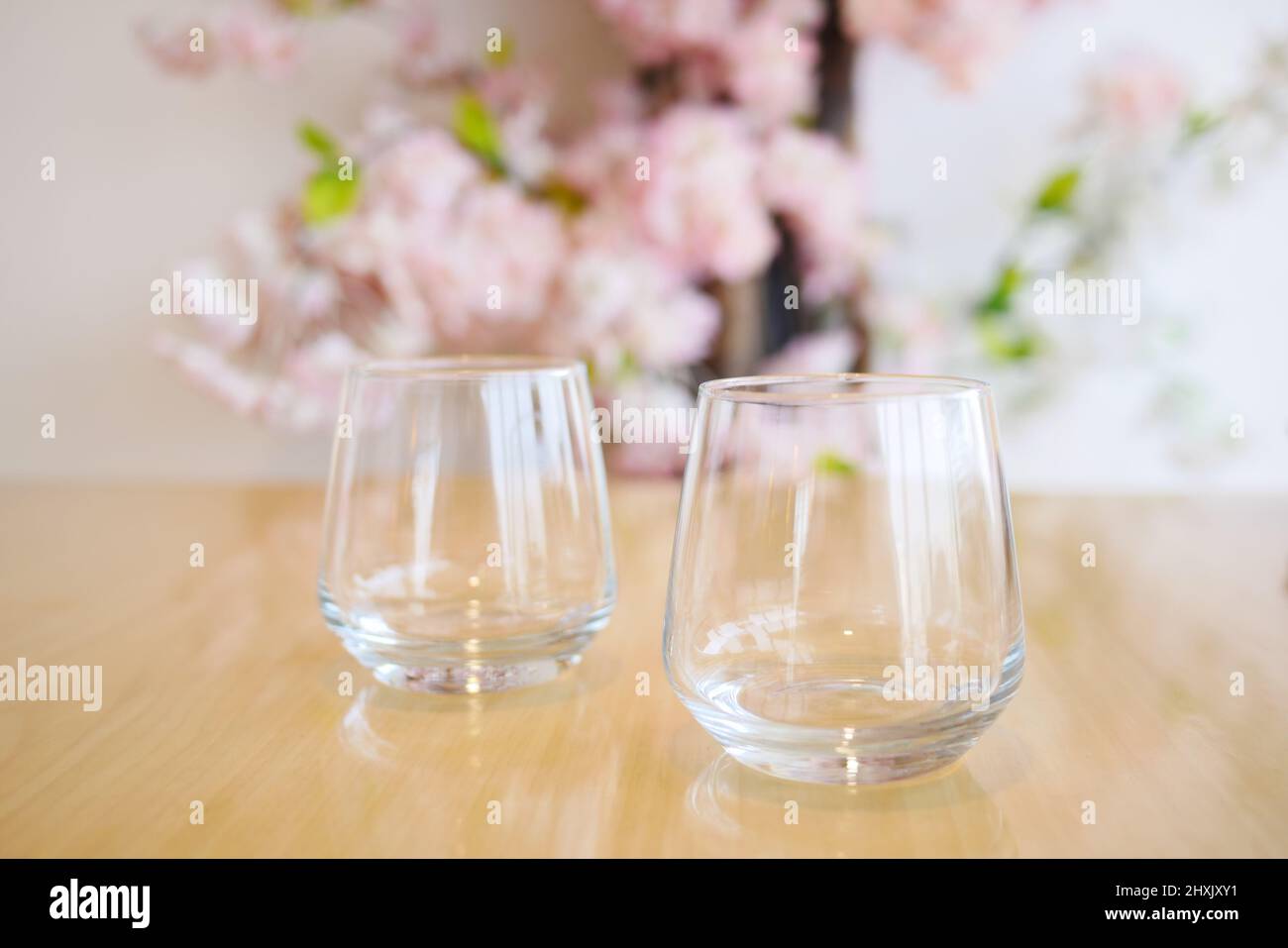 close up of empty drinking glasses on table  Stock Photo