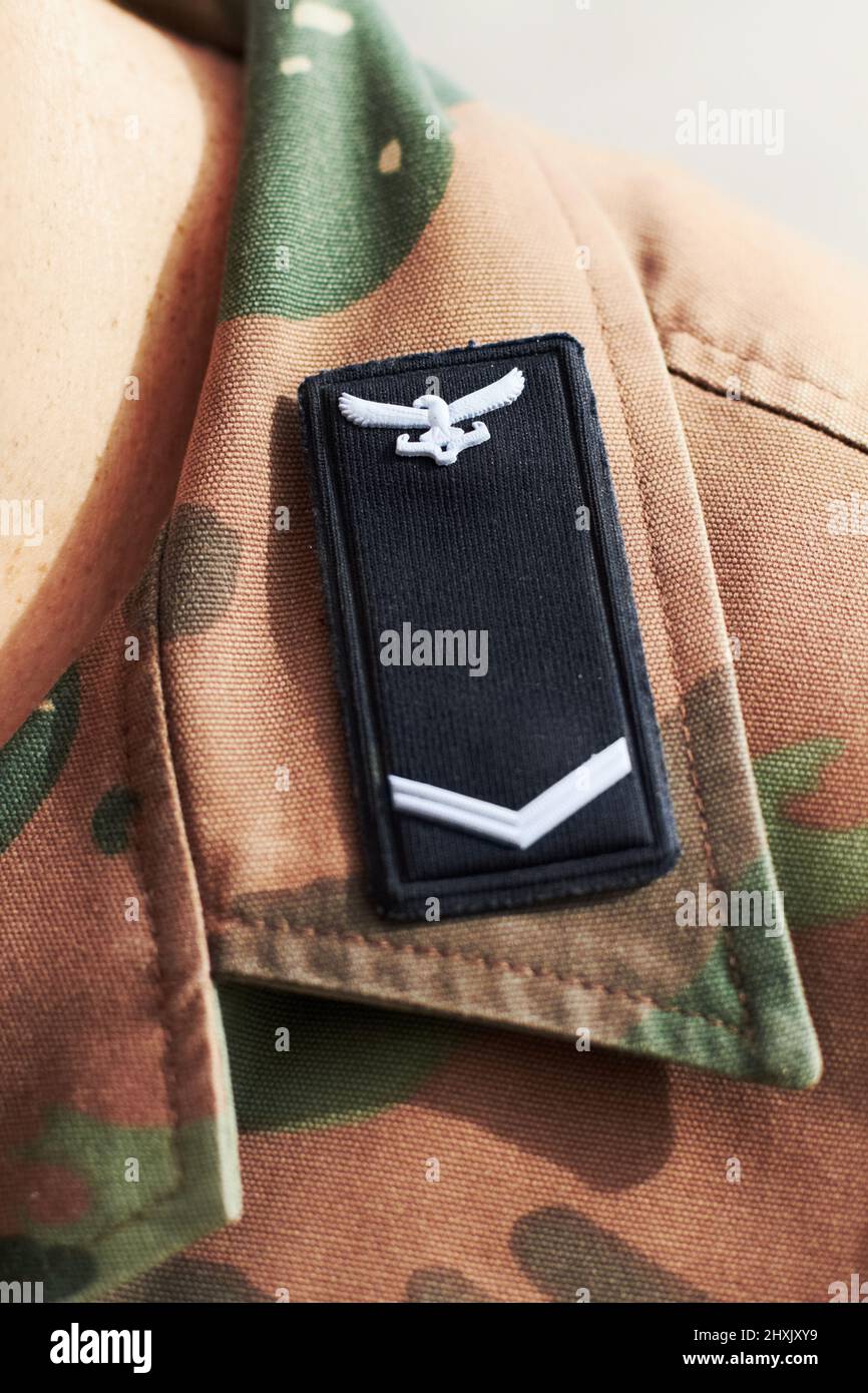 We have a proud military history. Closeup shot of a battalion insignia on a shoulders lapel. Stock Photo