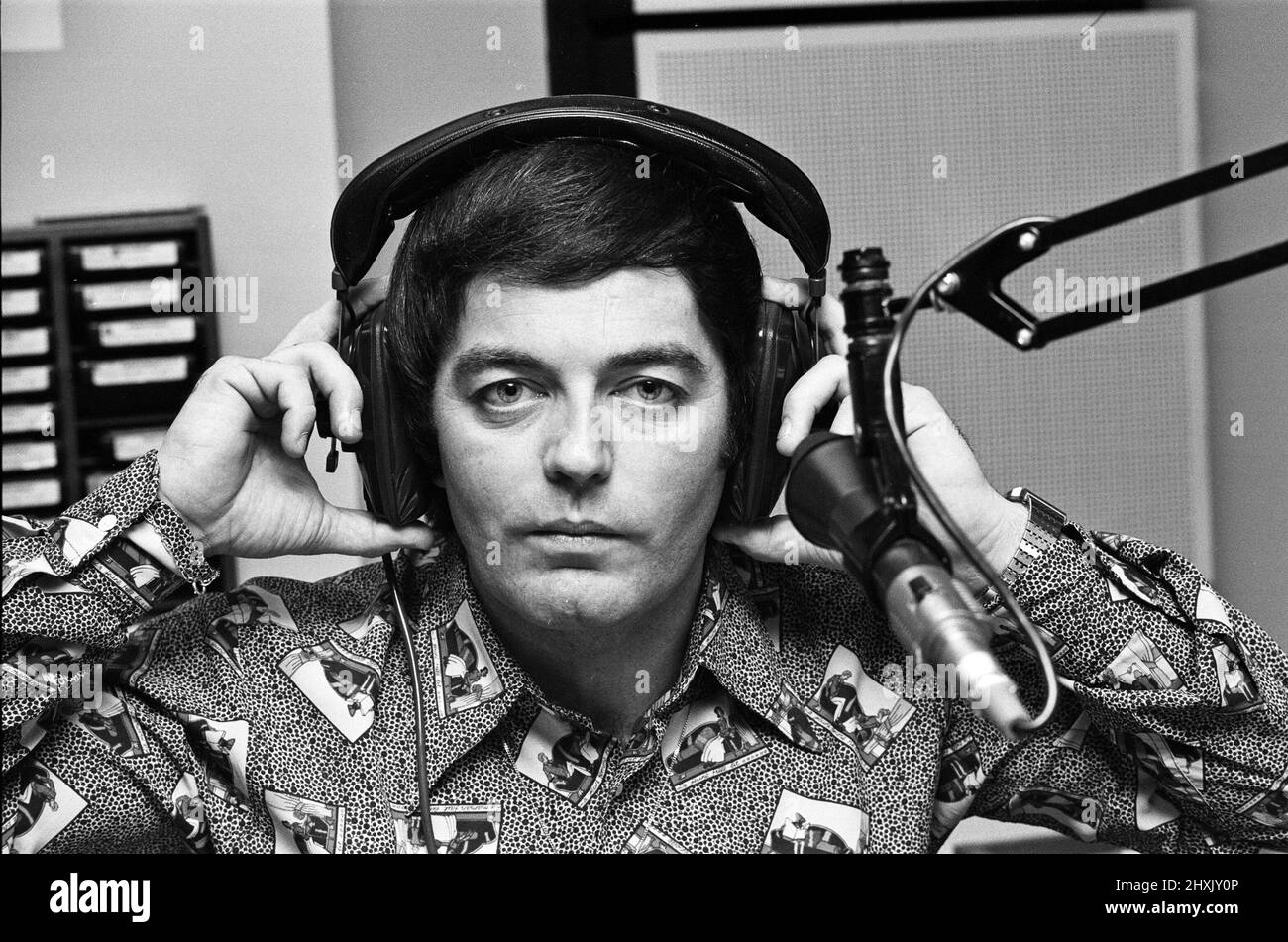 BBC DJ Tony Blackburn is pictured at work following his recent spilt from his wife. 14th October 1976. Stock Photo