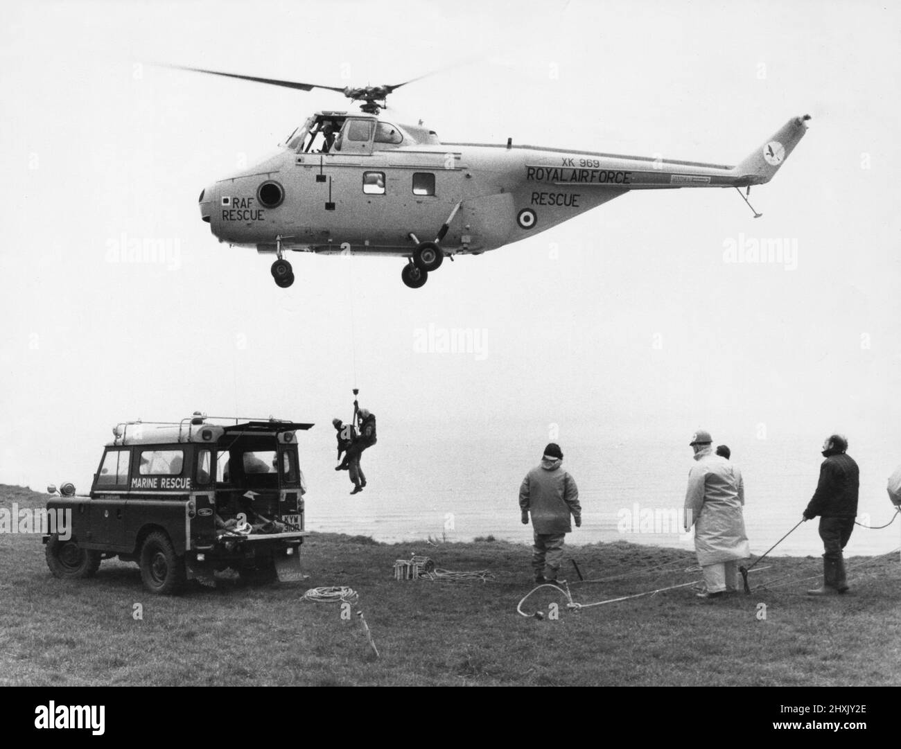 Westland Whirlwind HAR10 helicopter hovers over the cliffs at Sewerby