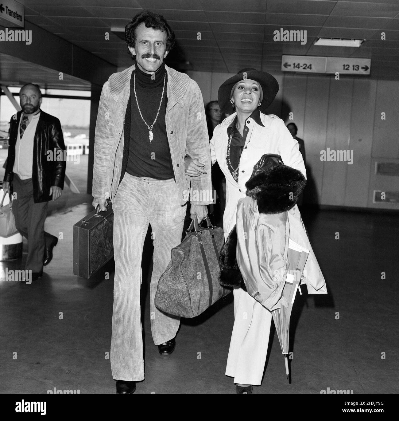 Singer Shirley Bassey and husband Sergio Novak arrive at London Airport from Switzerland. She is over here for a British tour. 24th April 1976. Stock Photo