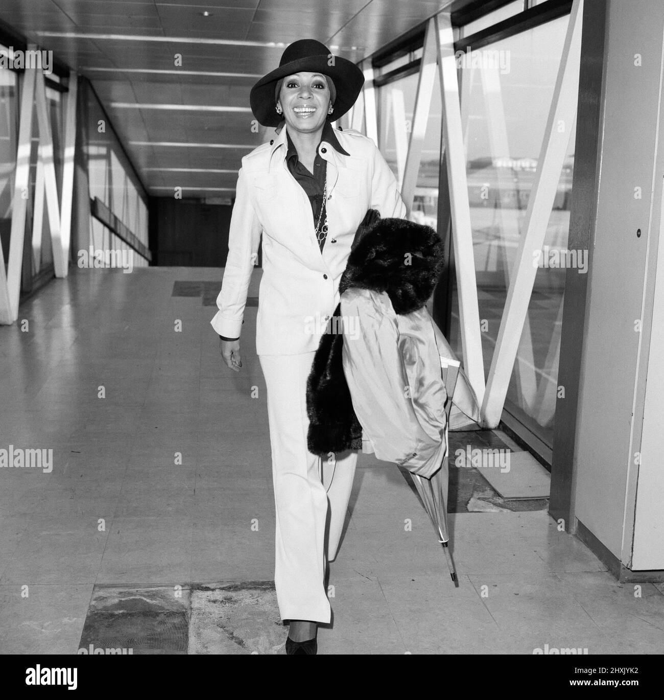 Singer Shirley Bassey arrives at London Airport from Switzerland. She is over here for a British tour. 24th April 1976. Stock Photo