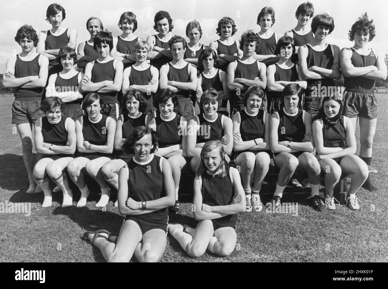 Members of Cleveland Schools Athletics Association who will be competing in the English Schools National Track and Field Championships (Hendon 8th and 9th July) pictured during break in training at Marton Sixth Form College, 30th June 1977. Back Row L-R. John Daley, Tim Freeman, Tommy Dunne, Philip Powell, Mark Robson, Paul Porter, Andrew Lennie, Peter Dee. Middle Row L-R. Mark Preston, Paul Gardner, Ian Lidster, Brian Sutherland, Mark Robinson, Paul Hargraves, Terry Franks, Robert Phoenix, Michael Thompson, Ian Purchon.  Front Row L-R. Janine McGregor, Ann Woodall, Sandra Laws, Janet Brems, S Stock Photo