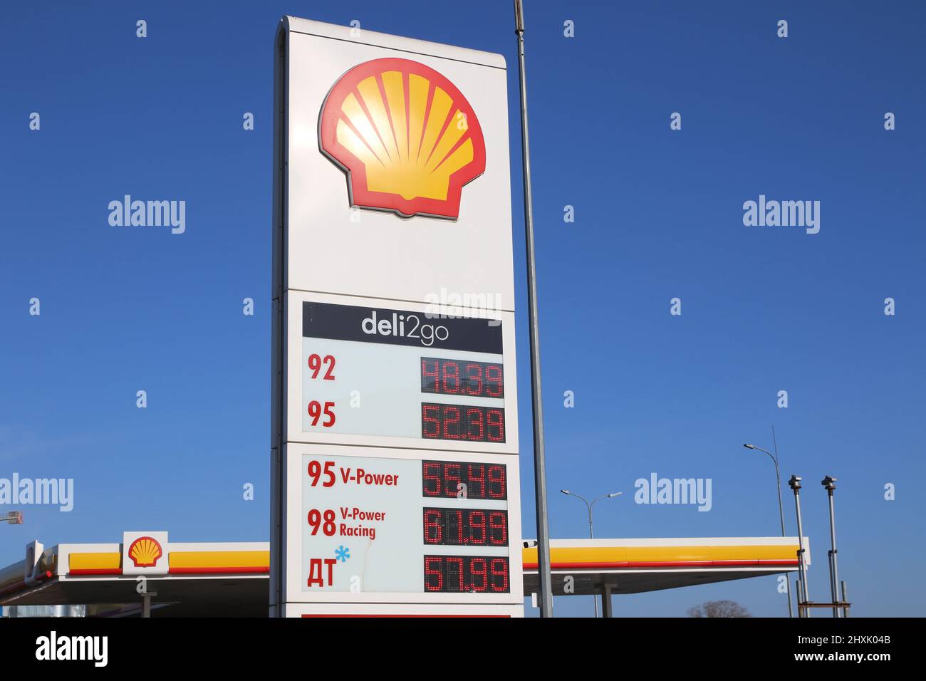 Gasoline prices displayed under a Shell logo at one of their petrol