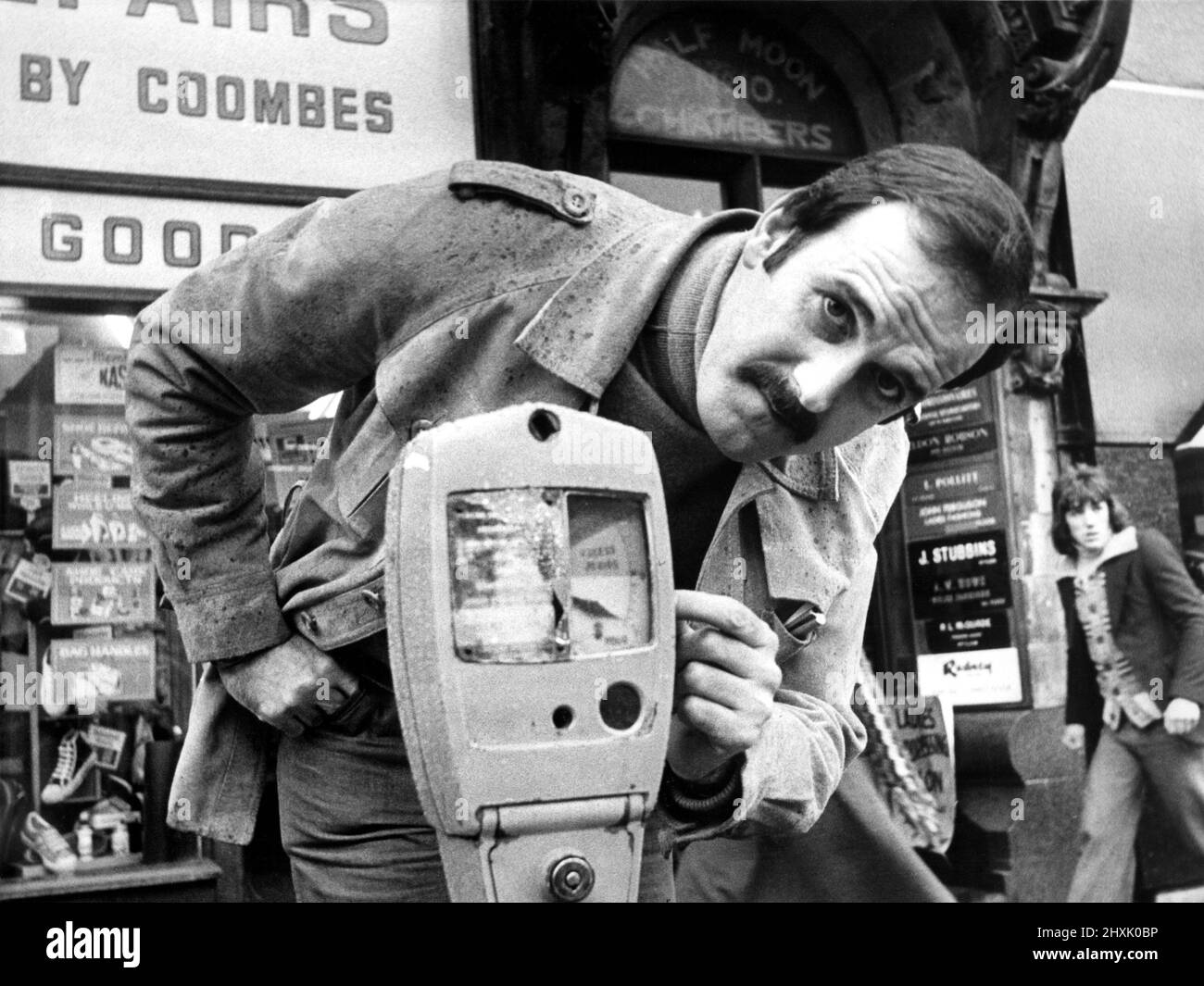 Basil Fawlty, in the shape of John Cleese, was in Newcastle to promote the book of scripts written by himself and his wife Connie Booth for the hit TV series Fawlty Towers.   John is pictured in Newcastle's Bigg Market.    21st November, 1977 Stock Photo