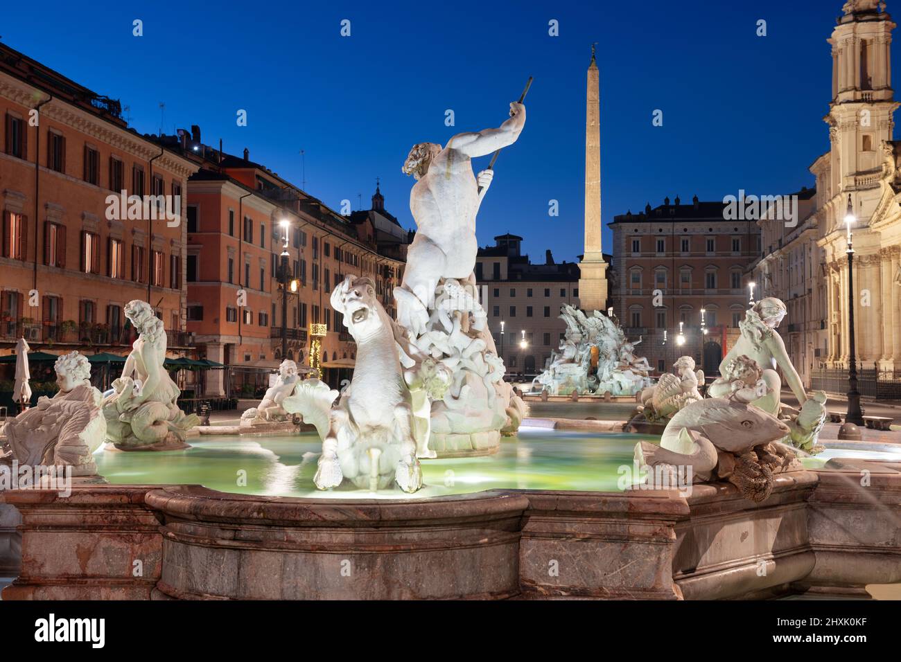 Fountains in Piazza Navona in Rome, Italy at twilight. Stock Photo