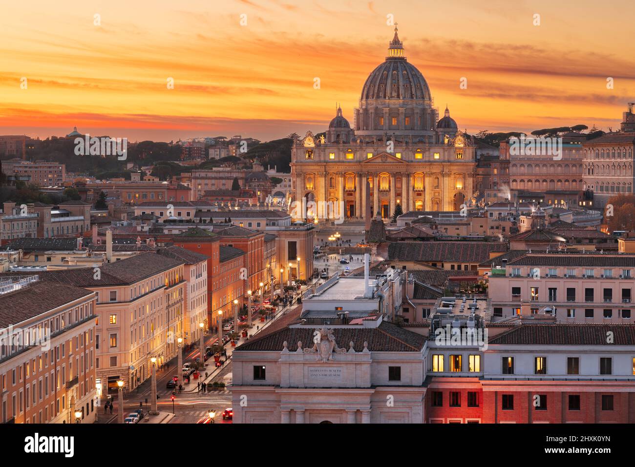 Vatican City skyline with St. Peter's Basilica during sunset. Stock Photo