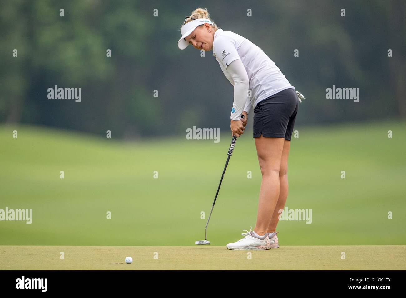 Pattaya Thailand - March 13:  Nanna Koerstz Madsen from Denmark in agony after missing a put to enter a play off on the 18th hole during the 4th and final day of The Honda LPGA Thailand at Siam Country Club Old Course on March 13, 2022 in Pattaya, Thailand (Photo by Peter van der Klooster/Orange Pictures) Stock Photo