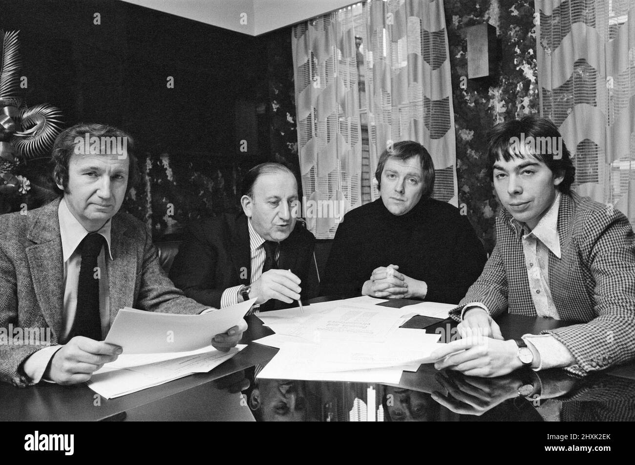 Tim Rice, has written a new Opera with Andrew Lloyd Webber based on Eva Peron.Picture shows Tim and Andrew and the business team.  Picture shows Left to Right : Roy Featherstone (boss of MCA Records) David Land (business manager) Tim Rice (Sir Time Rice) Andrew Lloyd Webber (Sit Andrew Lloyd Webber)  Evita is a musical with music by Andrew Lloyd Webber and lyrics by Tim Rice. It concentrates on the life of Argentine political leader Eva Per¿, the second wife of Argentine president Juan Per¿. The story follows Evita's early life, rise to power, charity work, and eventual death.  See other pictu Stock Photo