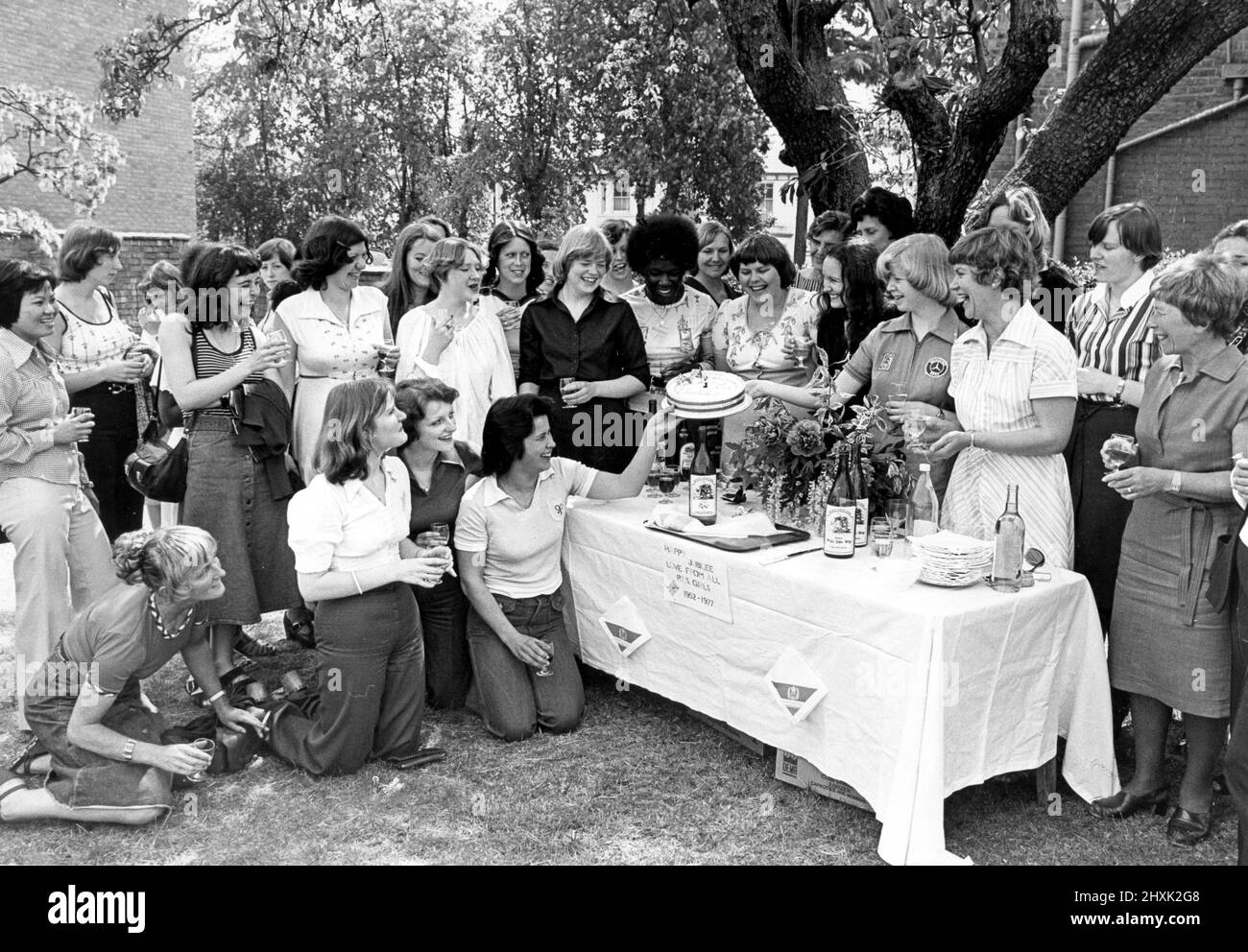 The girls at the South Warwickshire School of Nursing swopped uniforms for jeans and t-shirts for a combined end-of-term/Royal Jubilee party.  It was organised by tutors and held in the garden of the school in Radford Road,  Leamington.3rd June 1977 Stock Photo
