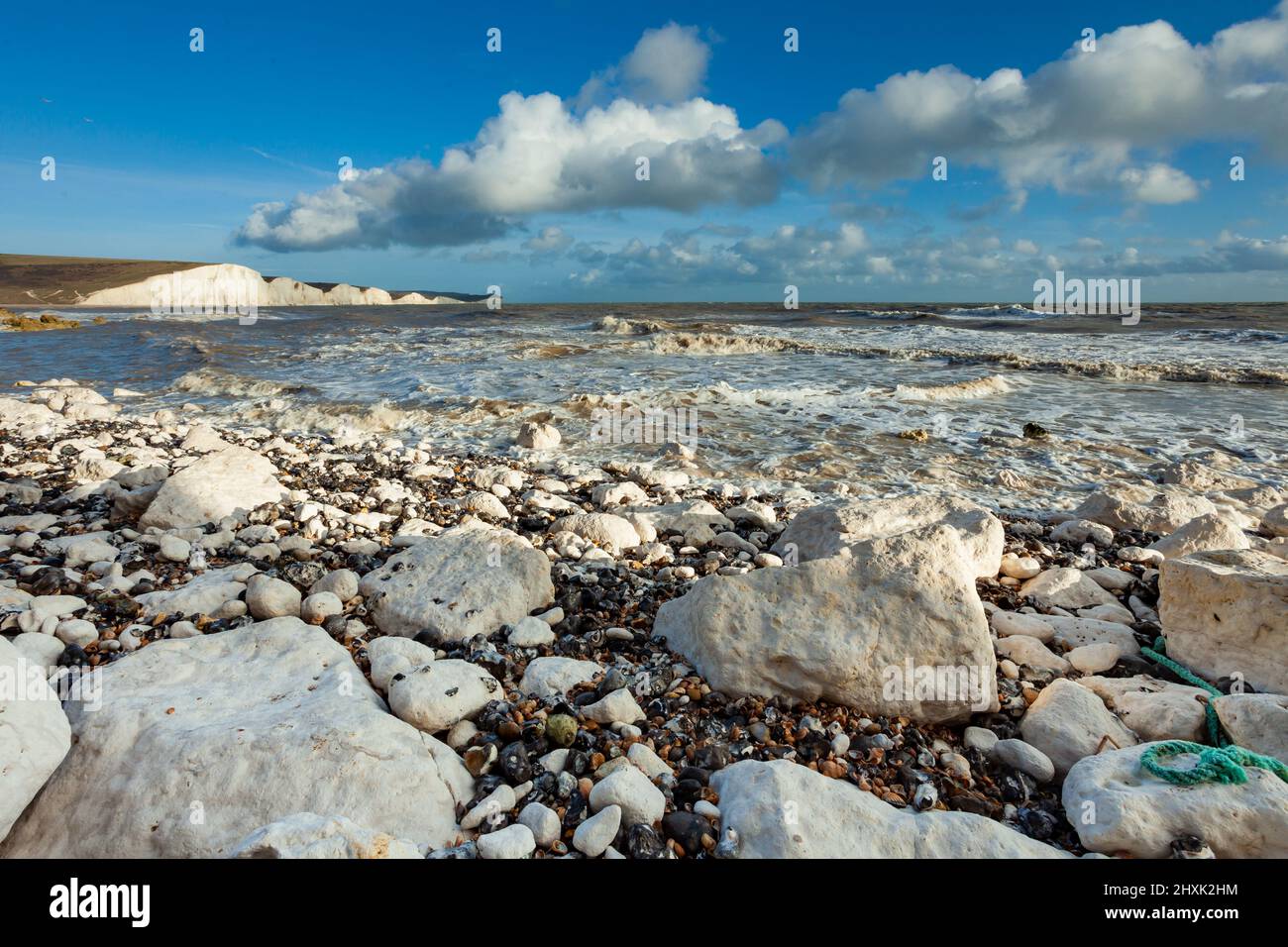 Crumbling chalk cliffs at Hope Gap in East Sussex, England. Seven