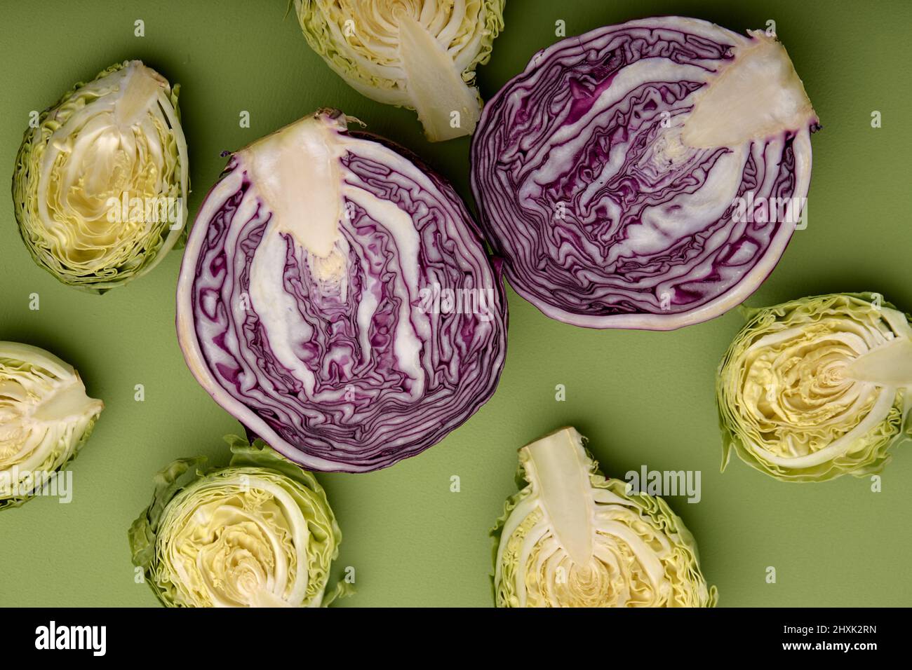 Slices of cabbage Isolated on green Background Top View. Advertising, Cuisine Menu, Food. close-up. view from above Stock Photo