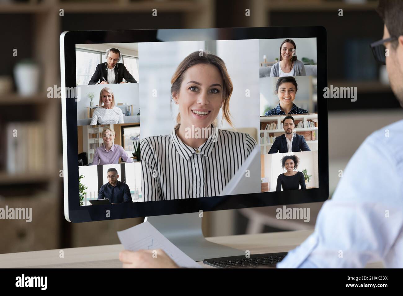Close up desktop computer screen with webcam video conference interface