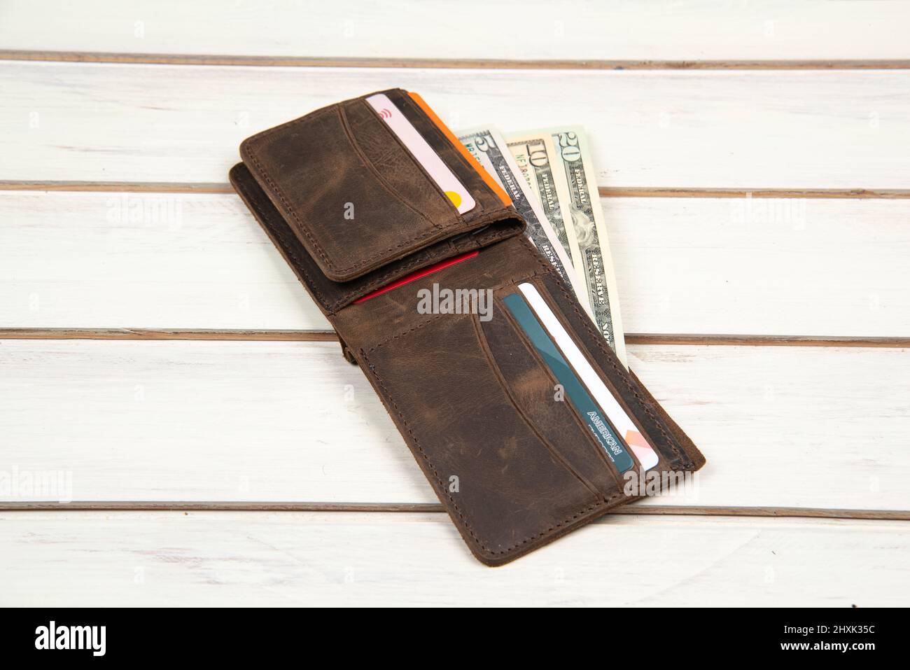 wallet with us dollars and credit cards Stock Photo - Alamy