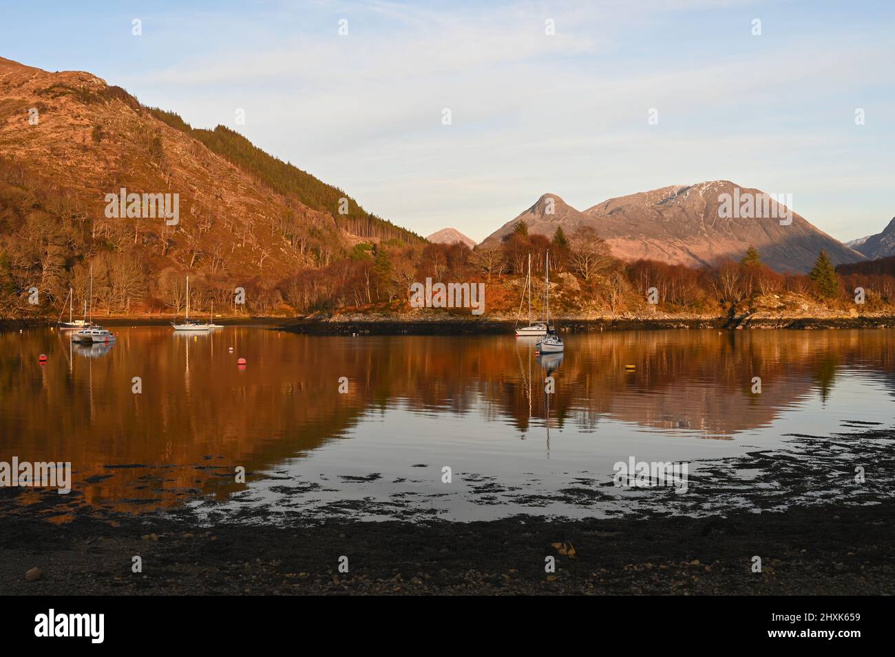 Loch Leven from North Ballachulish in Scottish Highlands. View of mountains, boats and reflections in water. Stock Photo