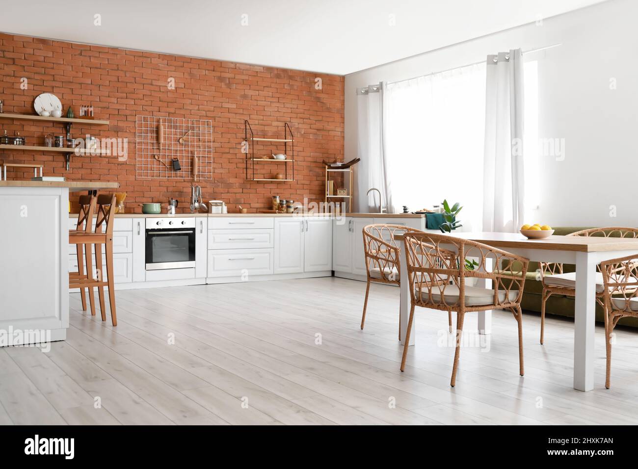 Interior of light kitchen with dining table and chairs Stock Photo - Alamy