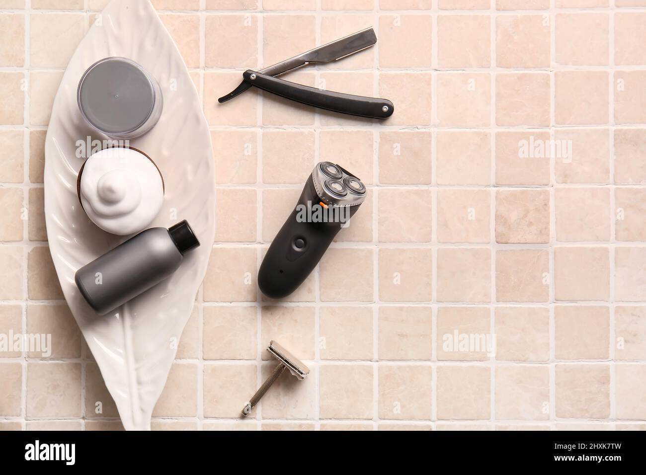Set of male accessories for shaving on tile background Stock Photo - Alamy