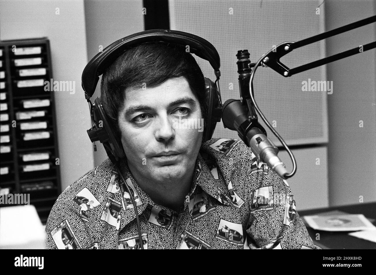 BBC DJ Tony Blackburn is pictured at work following his recent spilt from his wife. 14th October 1976. Stock Photo