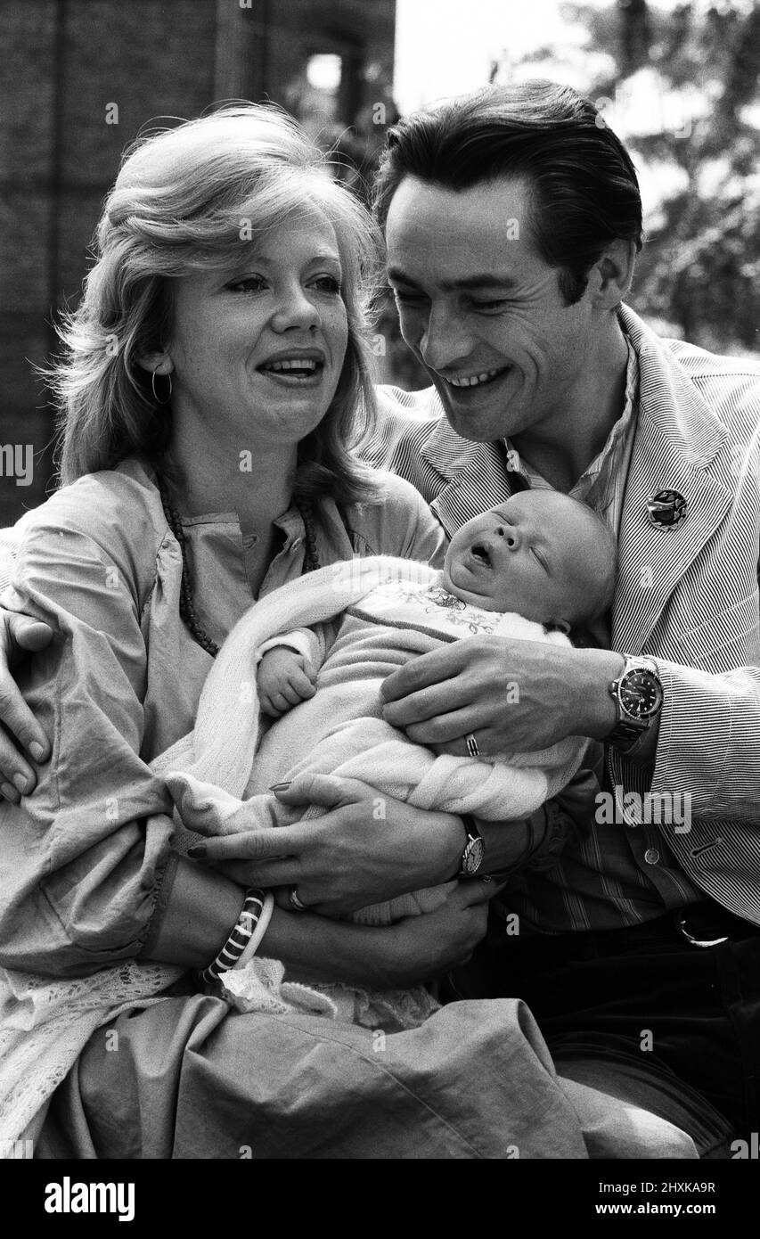 Actress Hayley Mills and actor Leigh Lawson proudly show off their love child for the first time since the baby's birth on July 30th. Weighing in at 8lb 14 oz and named Jason, Hayley gave birth at St Teresa's Hospital in Wimbledon. 11th August 1976. Stock Photo