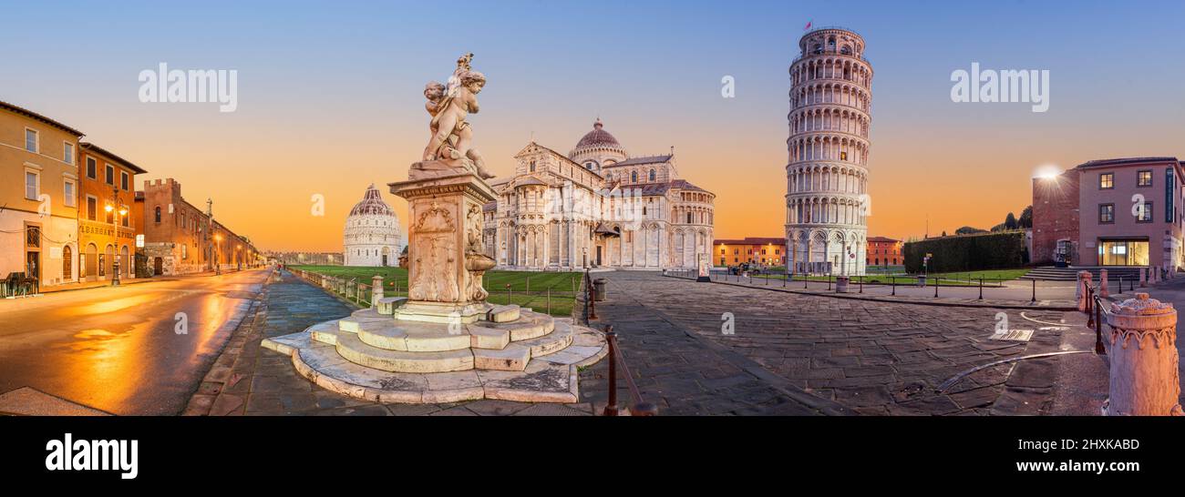 PISA, ITALY - DECEMBER 17, 2021: The Leaning Tower of Pisa in the Square of Miracles at twilight. Stock Photo