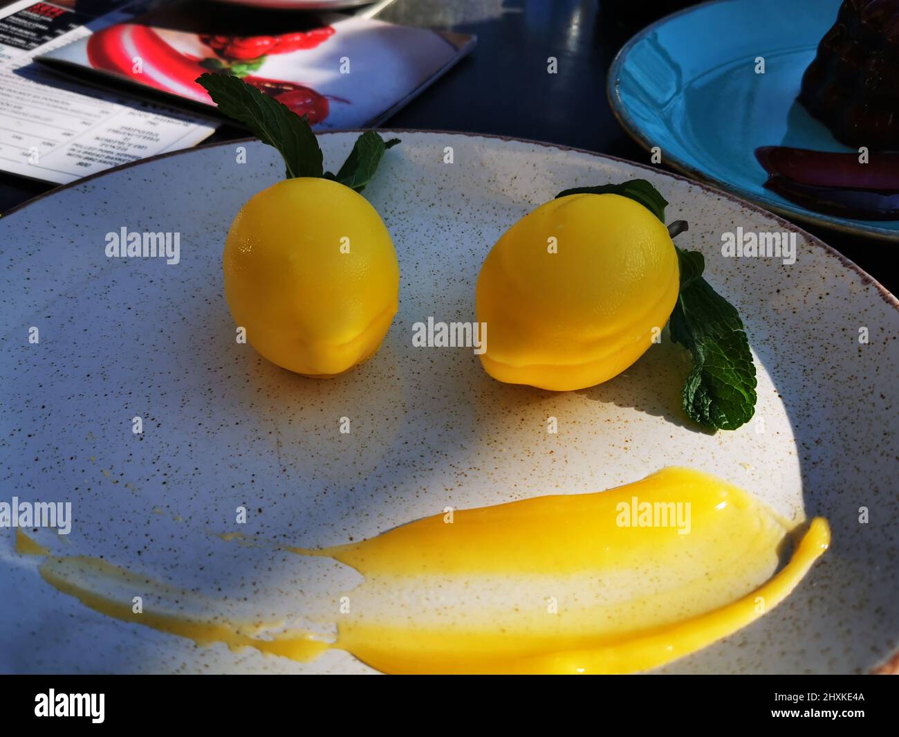 Dessert in the form of two lemons Stock Photo - Alamy