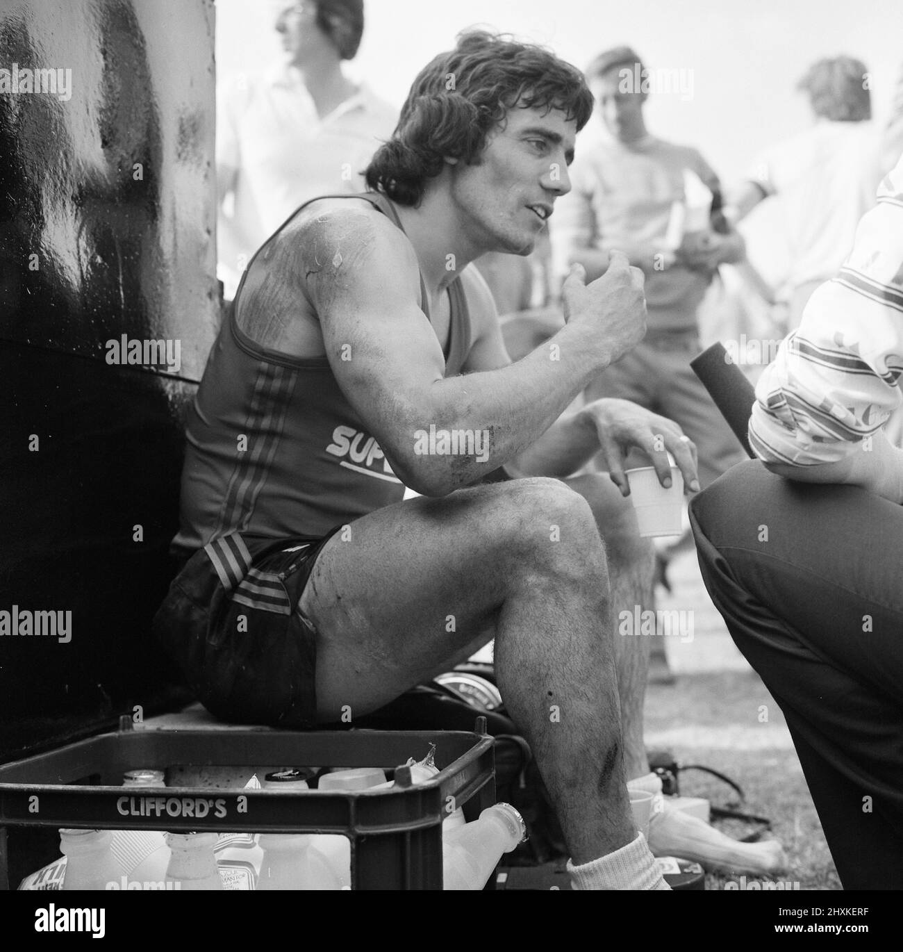 Superstars, BBC Television Programme, Filming of Heat in Bracknell, Berkshire, 25th June 1976. Liverpool Player, Kevin Keegan, his right shoulder, back, elbow, arm and leg, badly scraped, cut and bruised, after he toppled headlong on to the cinder track during cycle race. Stock Photo