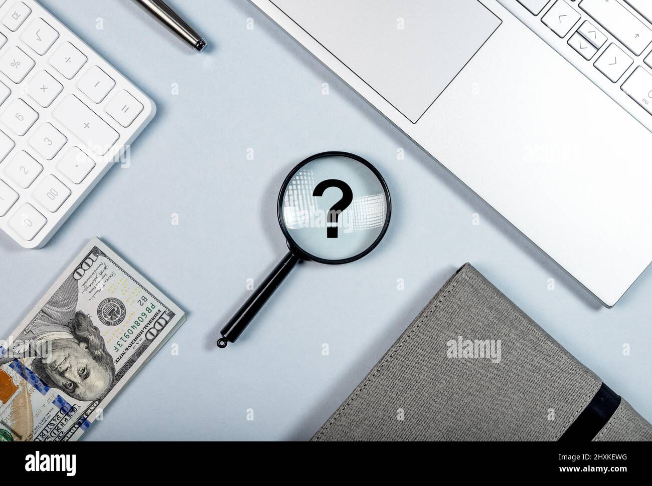 Q and A. Business Question mark through magnifying glass. High quality photo Stock Photo