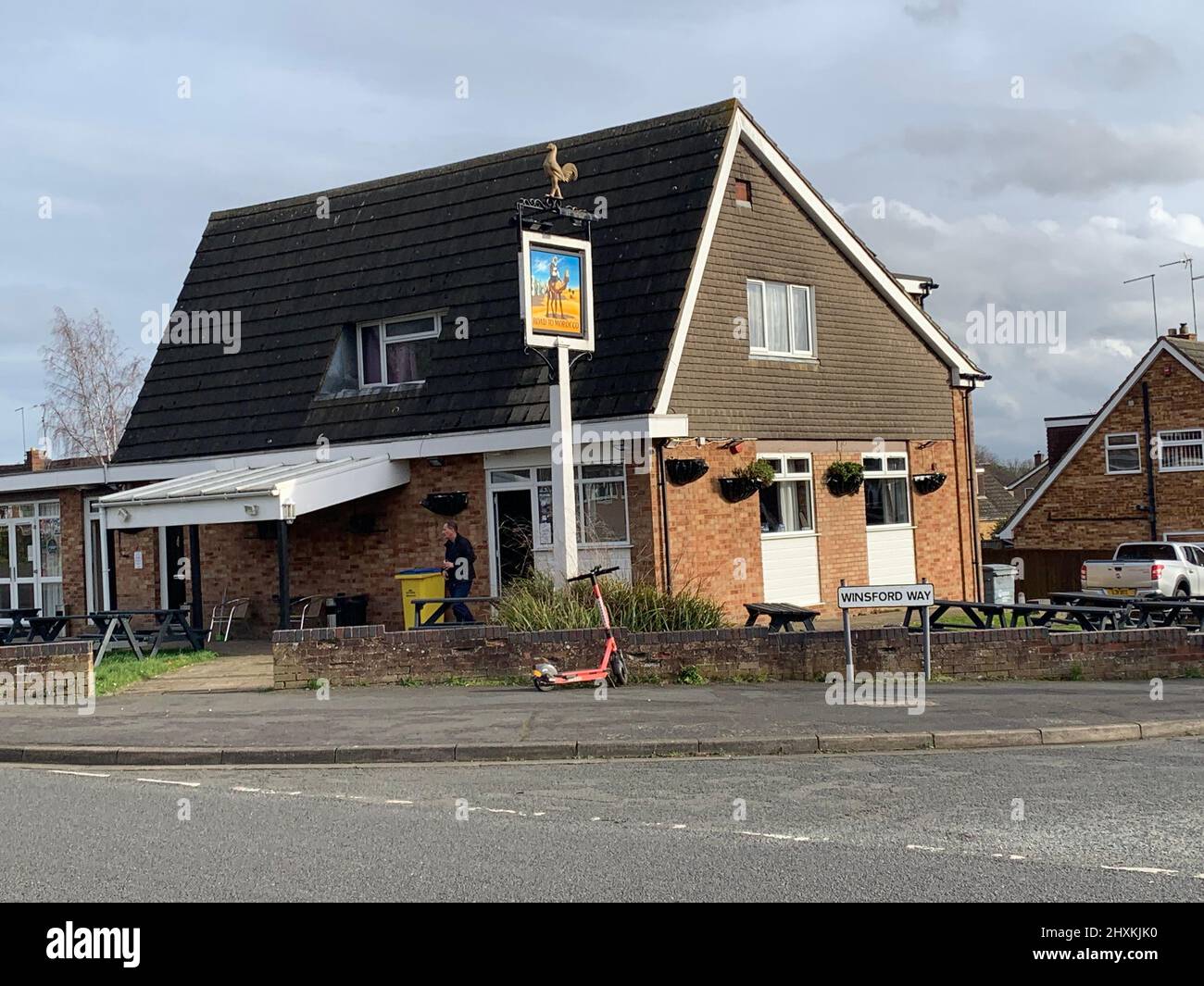 Pub The Road to Morocco Northampton England with camel sign on post beer alcohol cock bird