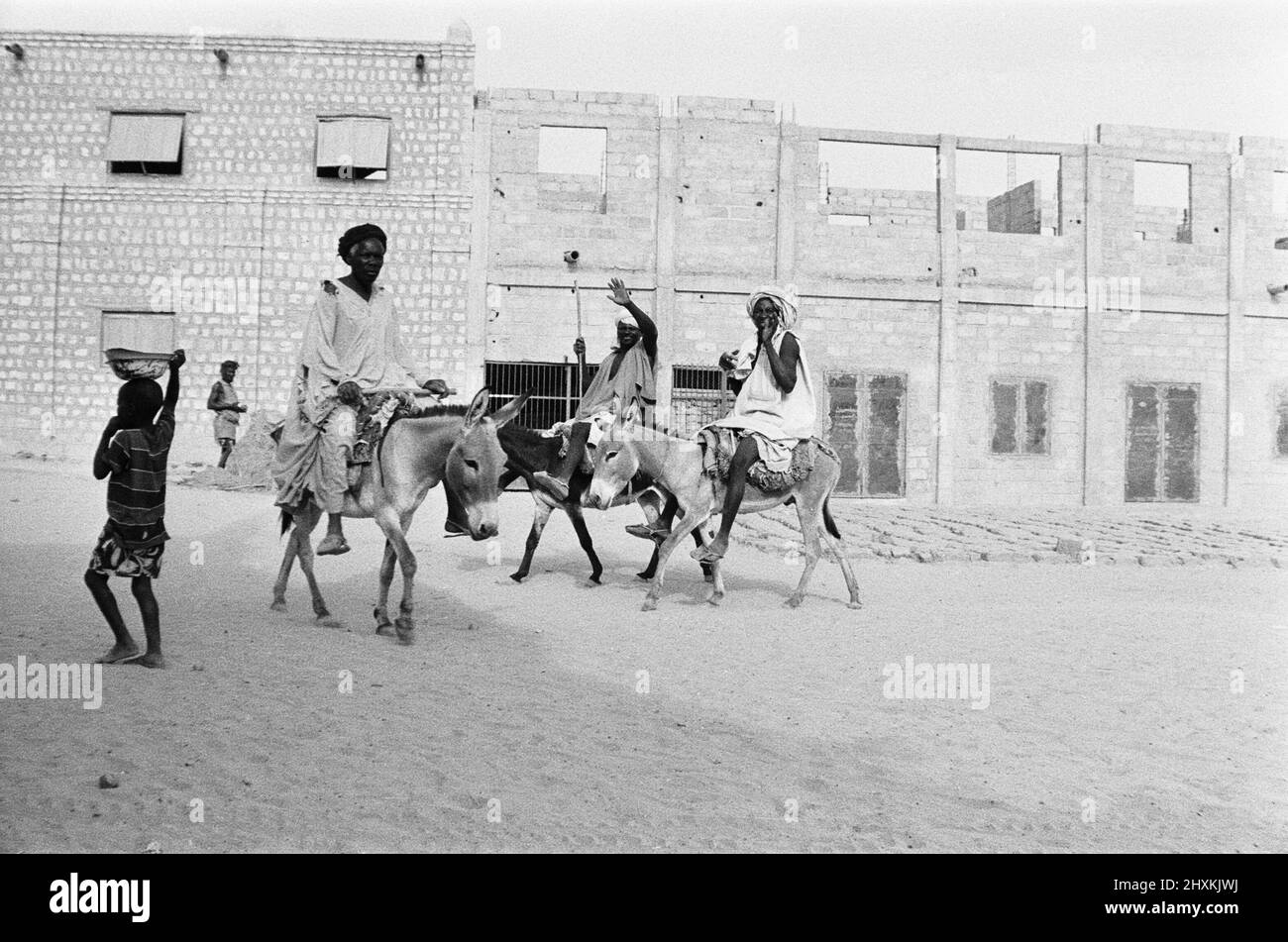 Local tribesmen riding into Timbuktu 23rd May 1976 Stock Photo