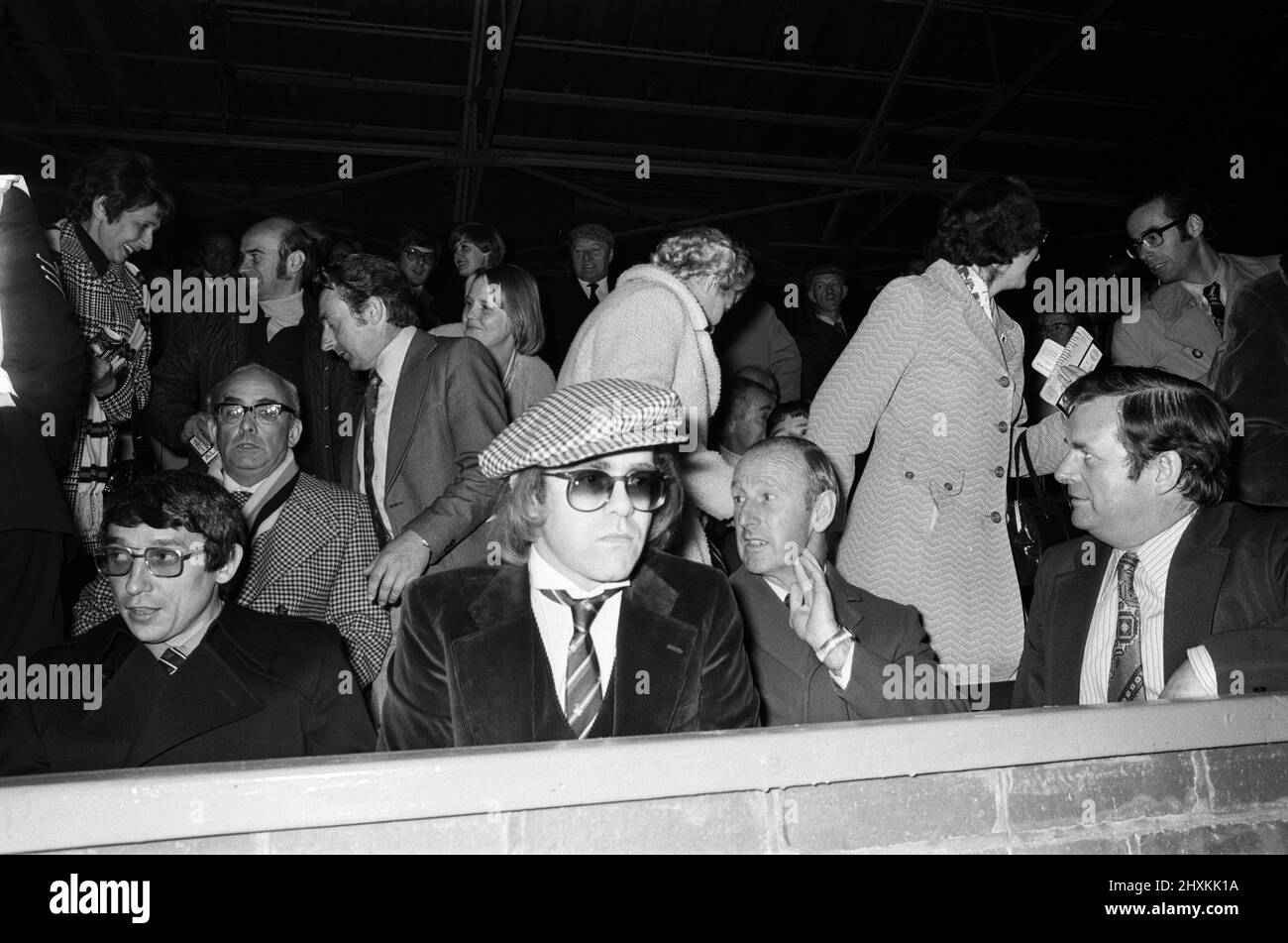 Graham Taylor and Elton John watching the football match, West Bromwich Albion v Watford.  25 October 1977. Stock Photo