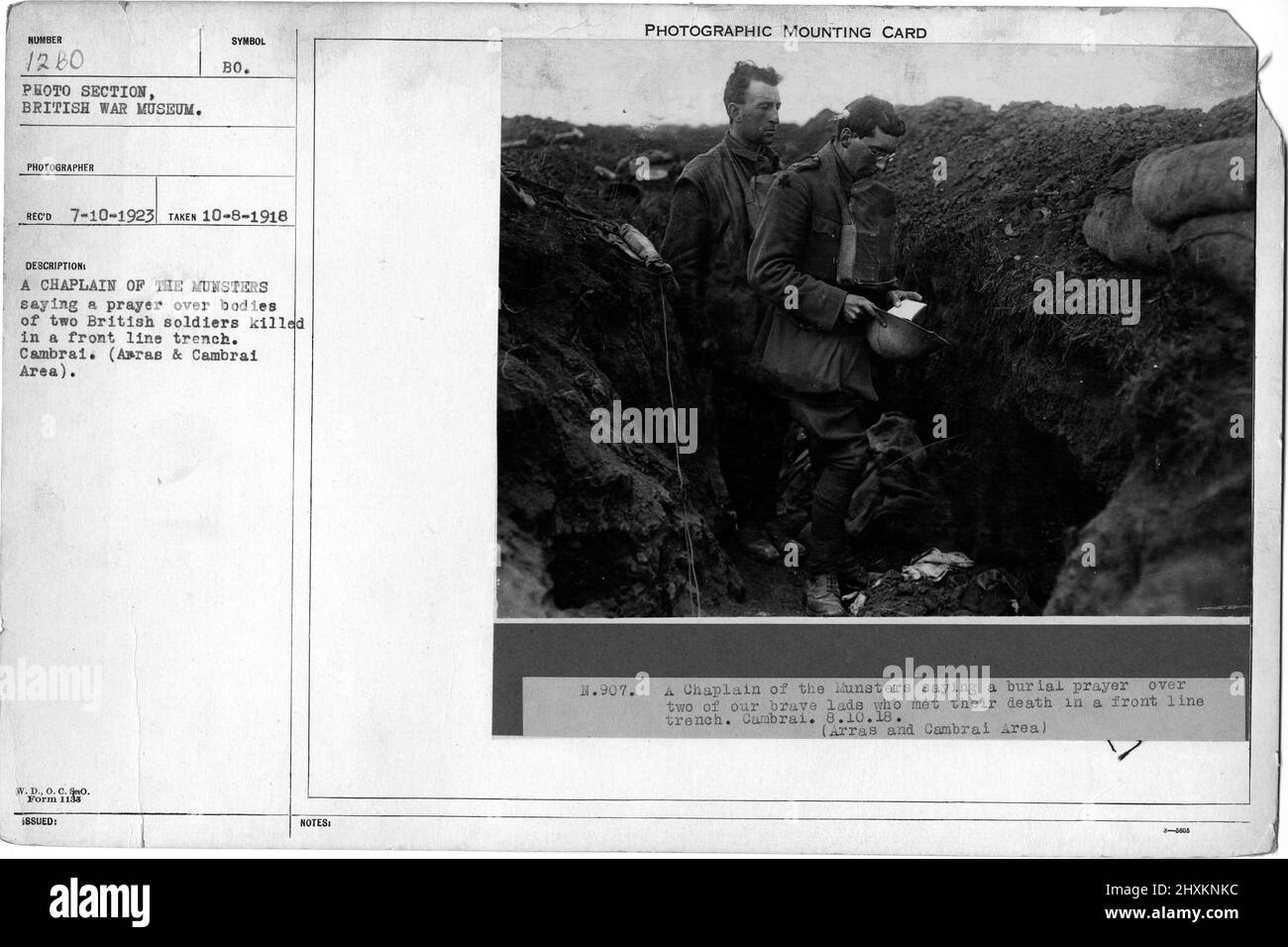 A Chaplain of the Munsters saying a prayer over bodies of two  British soldiers killed in a front line trench. Cambrai. (Arras & Cambrai Area). Collection of World War I Photographs, 1914-1918 that depict the military activities of British and other nation's armed forces and personnel during World War I. Stock Photo