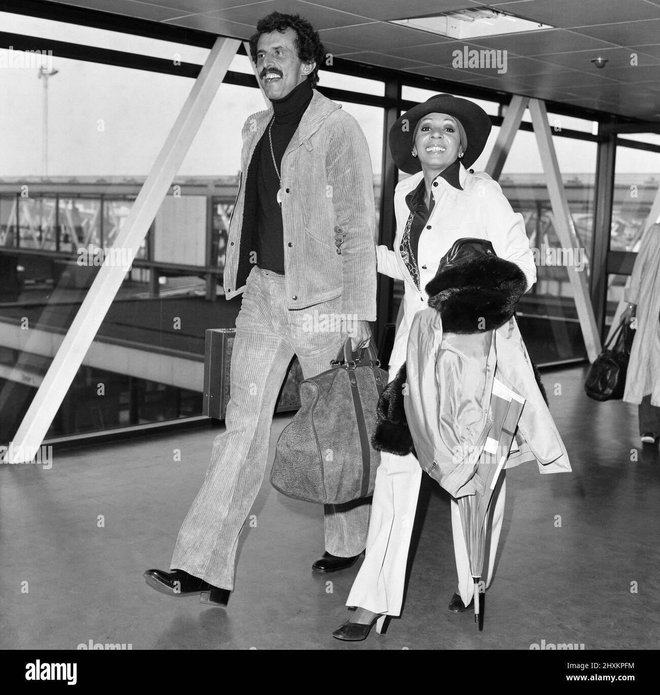 Singer Shirley Bassey and husband Sergio Novak arrive at London Airport from Switzerland. She is over here for a British tour. 24th April 1976. Stock Photo