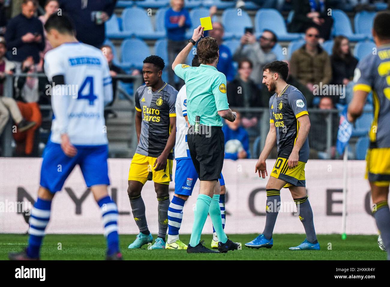 Zwolle Referee Martin van den Kerkhof gives Orkun Kokcu of Feyenoord