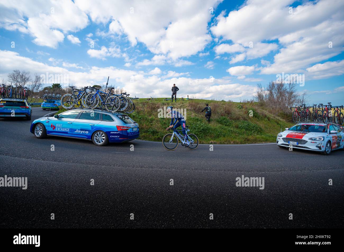 Italy, 12 March 2022 - professional cyclists travel an uphill road during the Tirreno Adriatico stage during the Apecchio - Carpegna stage in the Marc Stock Photo