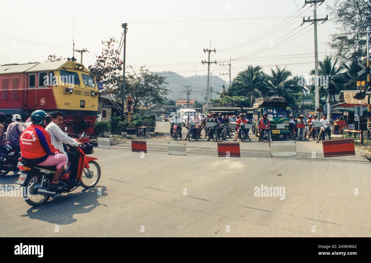 Caution train passing! The railway crossing gate at Hua Hin only is ...