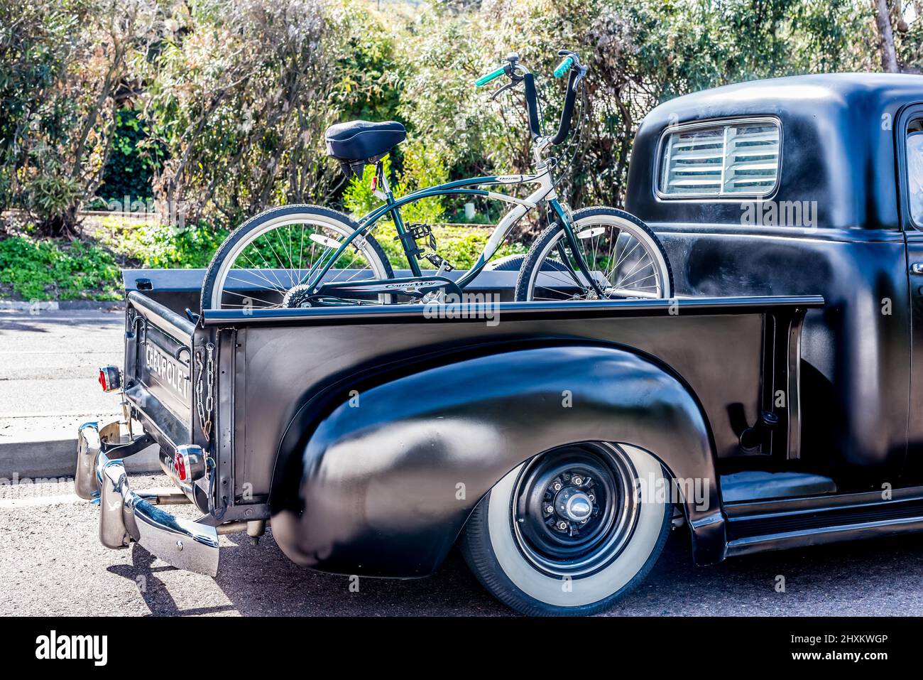 Vintage Chevrolet with Huffy Causeway Beach Cruiser Bike Stock Photo