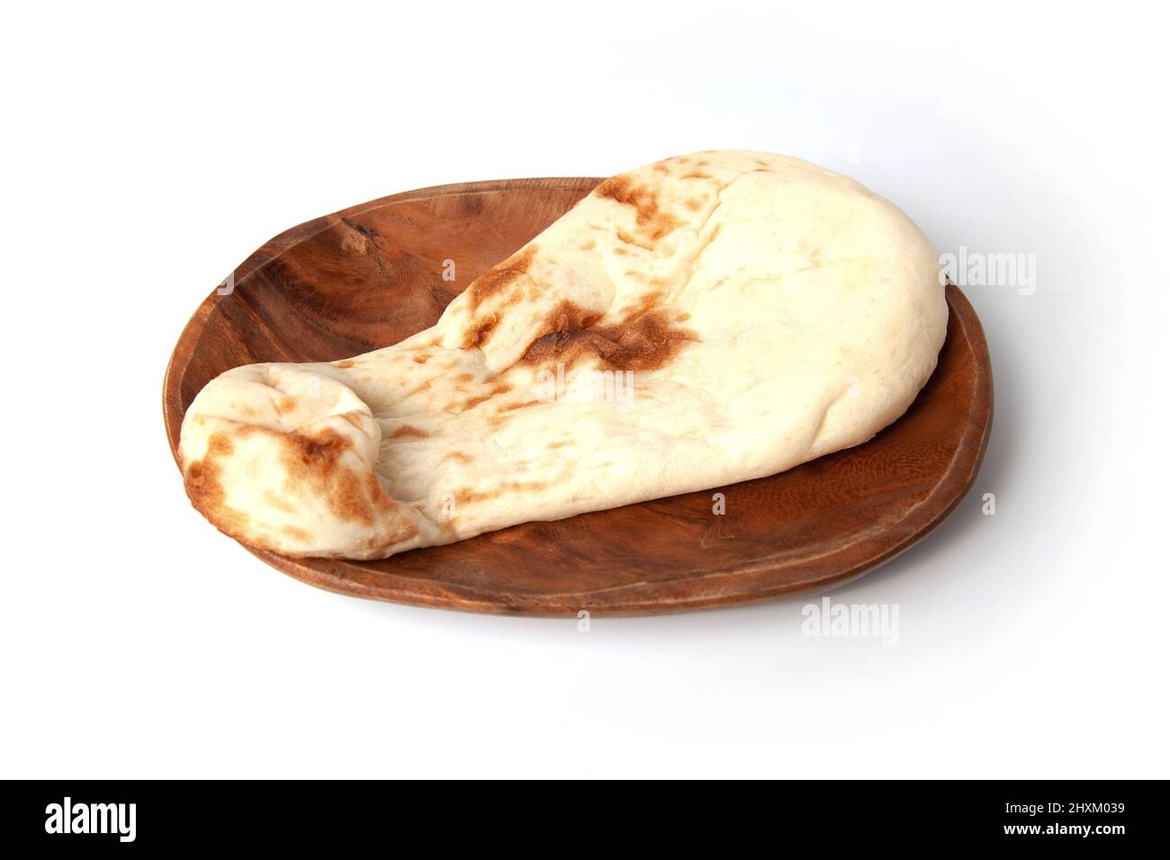 naan indian bread on plate isolated on white background Stock Photo