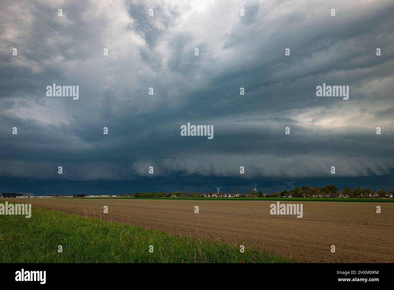 Severe thunderstorm with roll cloud over the fields of Holland Stock Photo