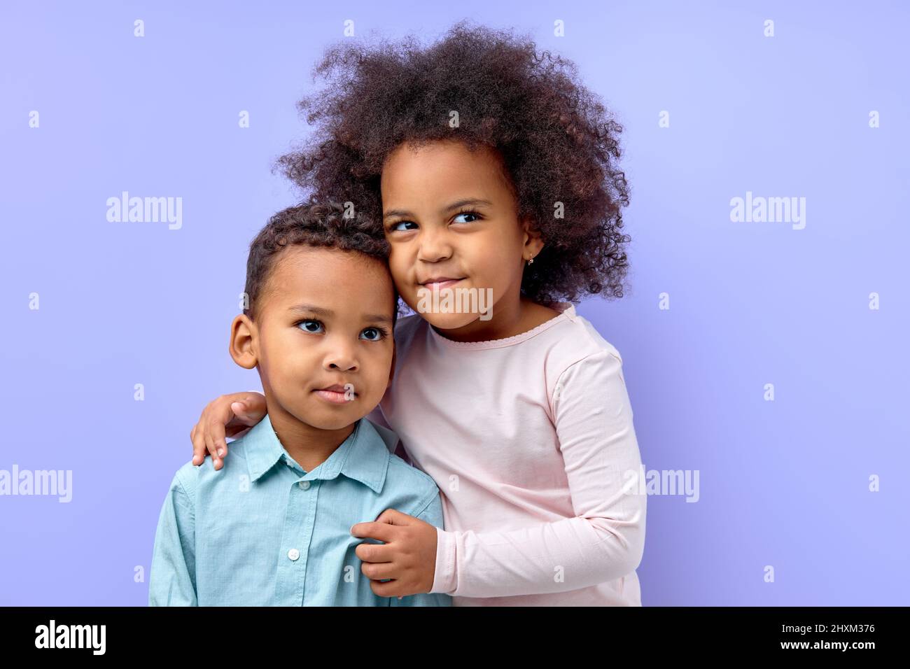 Photo of two young little black kids happy positive smile embrace ...