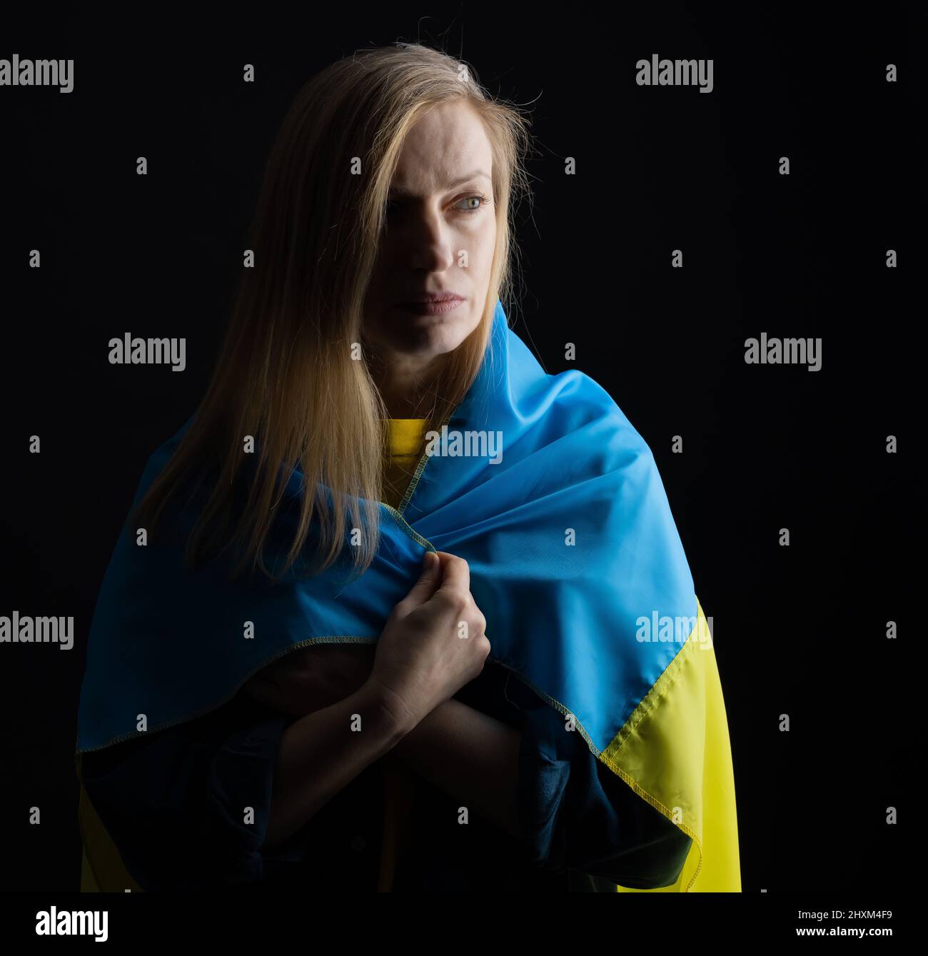 Woman with ukrainian flag Stock Photo