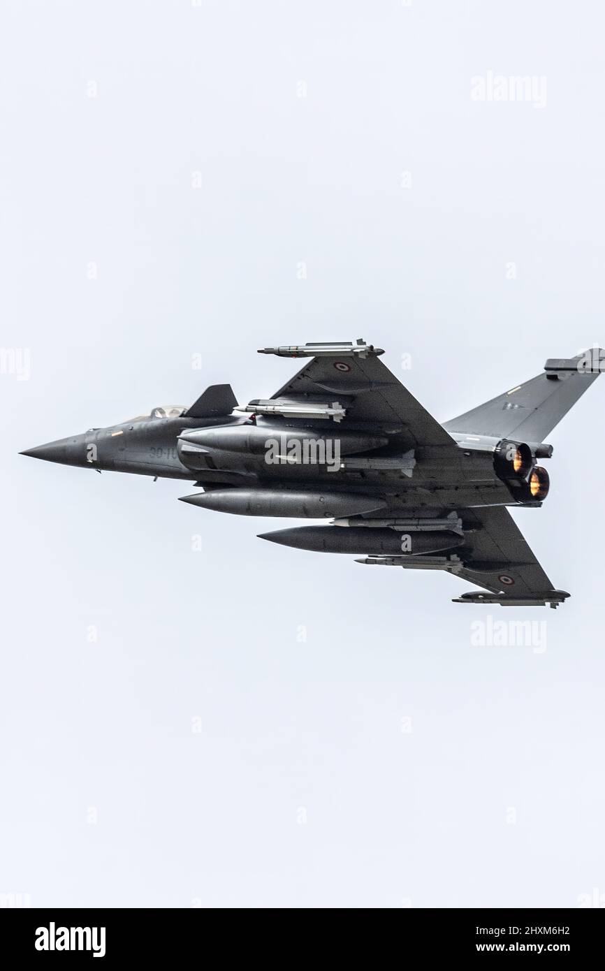 A French Rafale fighter hits the afterburners over Mont-de-Marsan Air Base as it launches on a Combat Air Patrol (CAP) mission over Poland. On February 24, the French Air Force began flying sorties over Poland, contributing to the security of the skies over the eastern part of the Alliance.  (Photo: NATO) Stock Photo