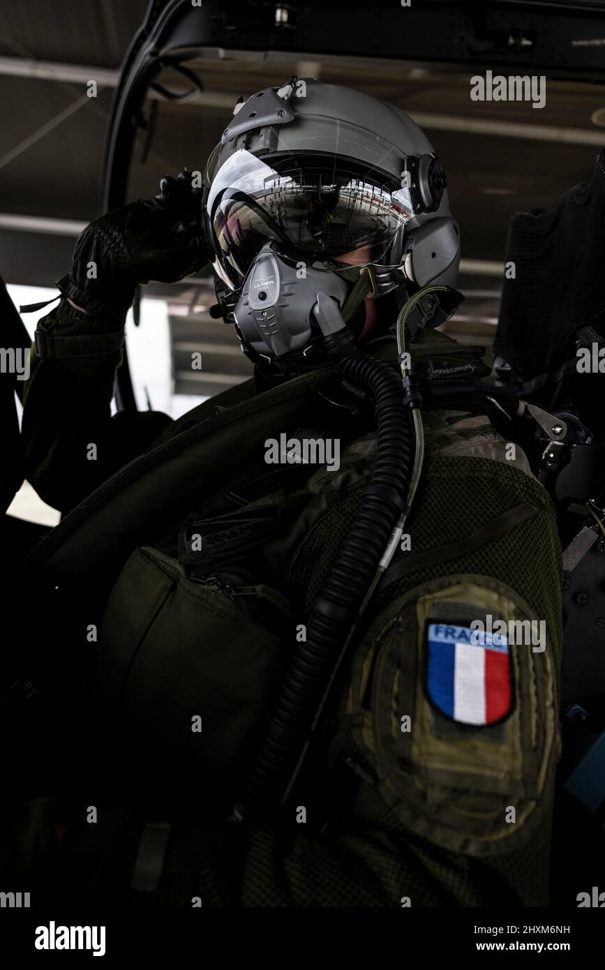 French Lieutenant “Balek” sits inside his Rafale fighter jet at Mont-de-Marsan Air Base. On February 24, the French Air Force began flying sorties over Poland, contributing to the security of the skies over the eastern part of the Alliance.  (Photo: NATO) Stock Photo